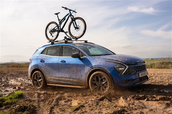 Kia Sportage driving in mud